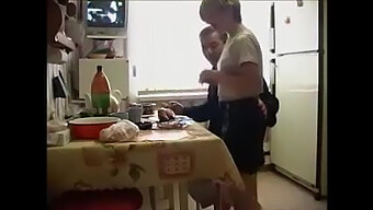 Step Dad And Daughter Share A Romantic Meal Together On The Kitchen Wall